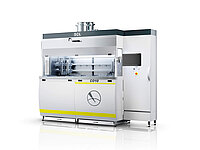 Industrial semiconductor processing equipment with enclosed chamber, viewing window, and exhaust system.