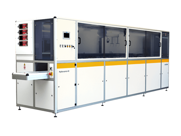 Industrial semiconductor processing system with long enclosed structure and conveyor access point.