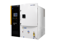 Modern semiconductor processing equipment with control panel and enclosed chamber.