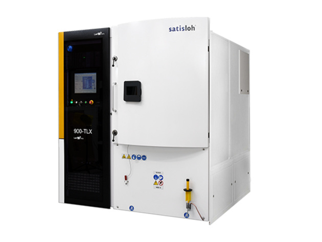 Modern semiconductor processing equipment with control panel and enclosed chamber.