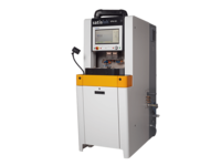 Frontal view of Satisloh SPM-50 grinding machine used in precision optics manufacturing.