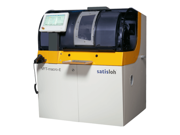 Automated industrial machine with enclosed housing and side control monitor for precise manufacturing processes