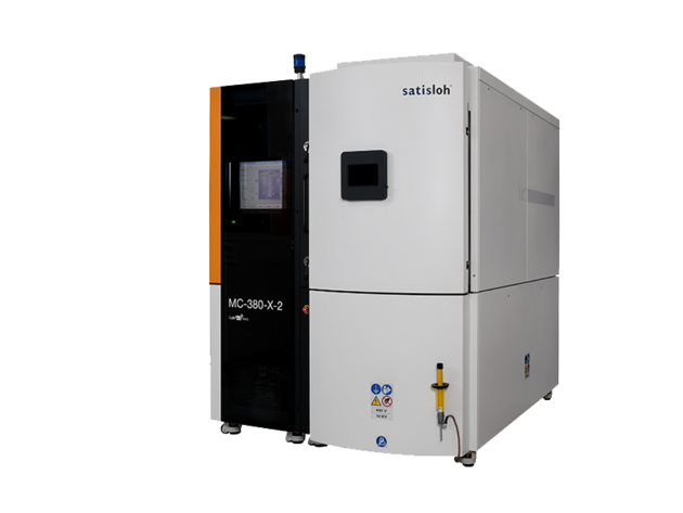 Industrial vacuum coating machine with control panel, used for optical lens manufacturing.