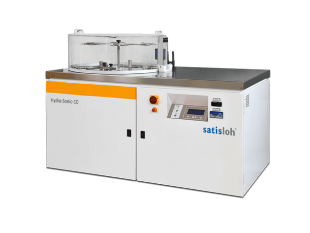 Industrial semiconductor processing machine with control panel and integrated wafer bath system.