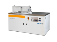 Industrial semiconductor processing machine with control panel and integrated wafer bath system.