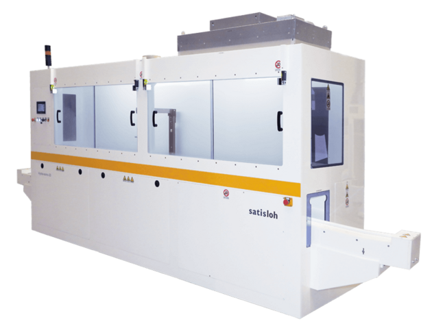 Large enclosed semiconductor processing machine with multiple access doors and conveyor entry slot.