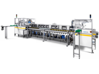 Large automated assembly line machine with multiple stations for semiconductor or electronics production.