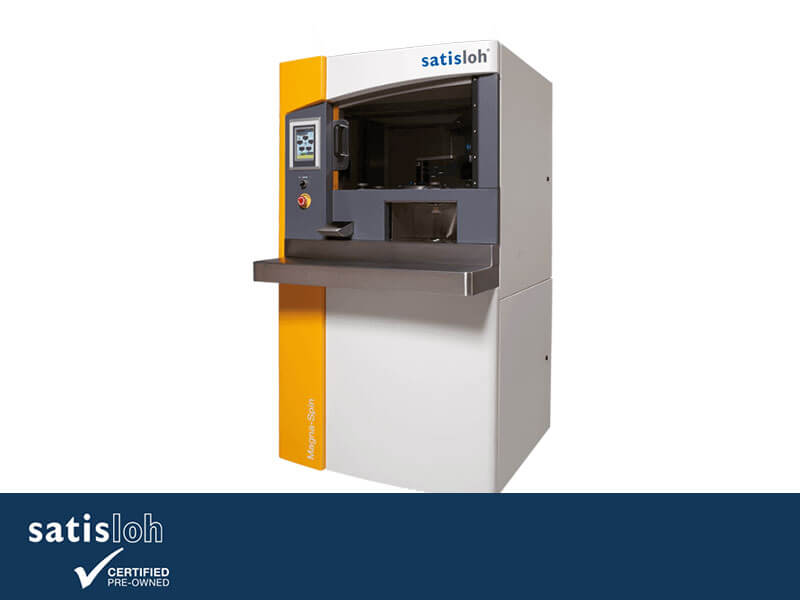 Compact laboratory machine with control screen and enclosed testing area.