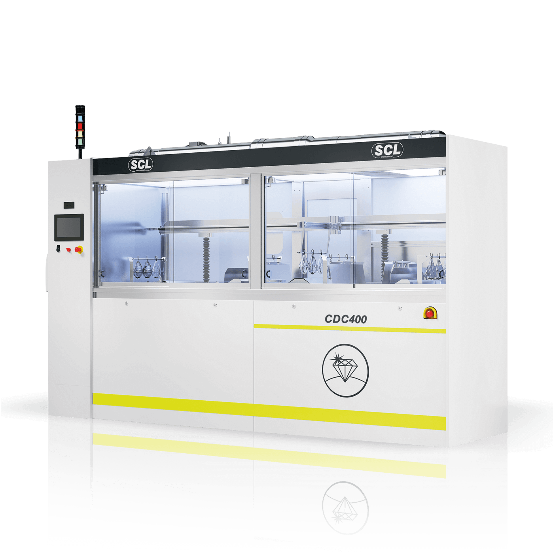 Large industrial cleaning machine with transparent compartments and control panel, used in lens manufacturing.