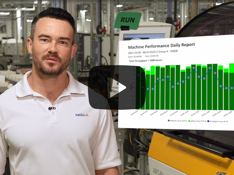 Man in a white polo shirt standing in a factory, with a chart overlay showing production data.