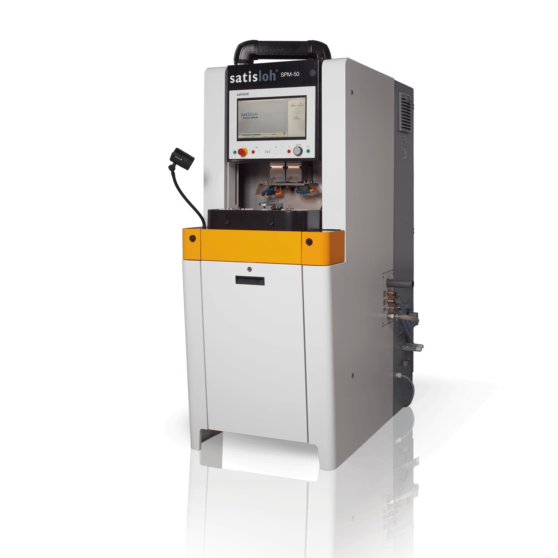 Frontal view of Satisloh SPM-50 grinding machine used in precision optics manufacturing.