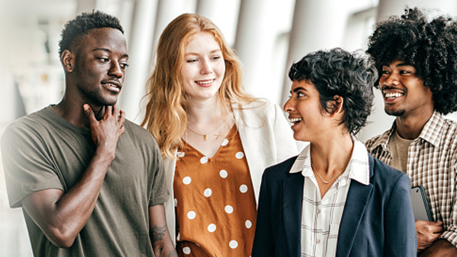 Diverse group of people representing Satisloh’s inclusive workplace.